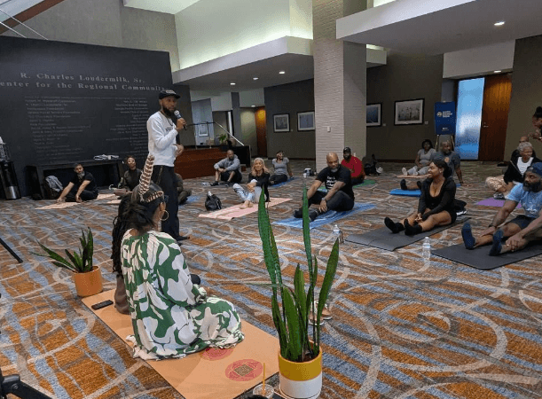 Louis Burrell leading a guided breathwork session